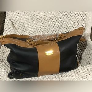 NWOT Joy Mangano travel bag with wheels